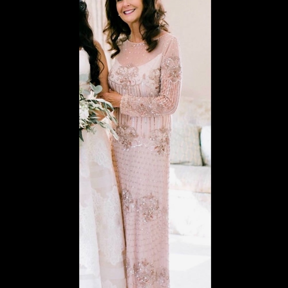 SOLD.         A mother of the bride dress, heavily sequenced, gold and silver